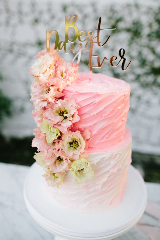 wedding cake with yellow flowers and tops for pink orange and white spring wedding 2021