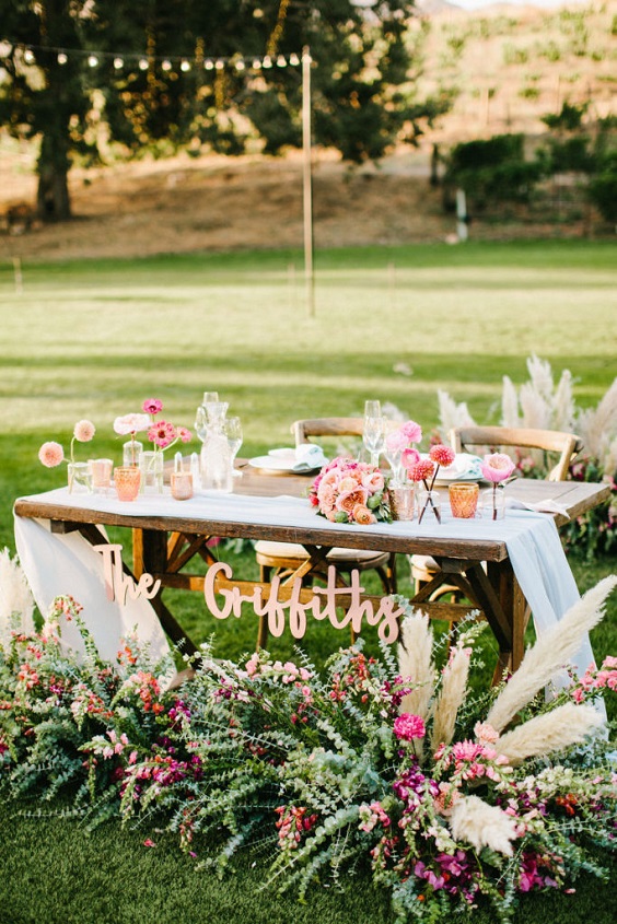 white table liner with flowers for pink orange and white spring wedding 2021