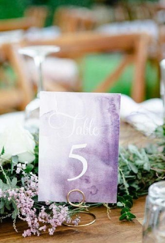 lavender centerpiece and table number for lavender and greennery spring wedding 2021