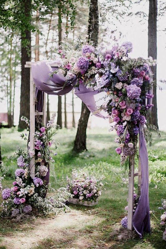 marriage ceremony decorations lavender bouquets and towel decorate altar for lavender and greennery spring wedding 2021