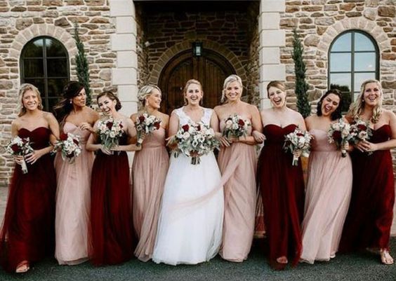 Blush wedding dress with burgundy 2025 bridesmaids