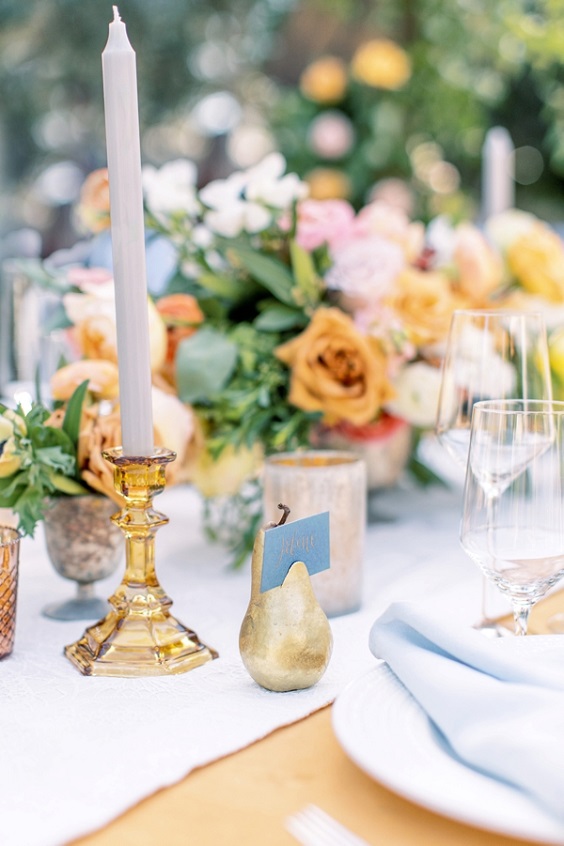 light blue candle and yellow green centerpieces for light blue and yellow summer wedding 2020