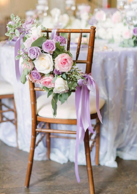 chair with lilac and pink decorations for lilac and pink summer wedding 2020