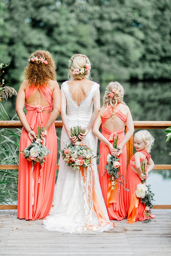 white gown and coral bridesmaid dresses for coral and peach summer wedding 2020