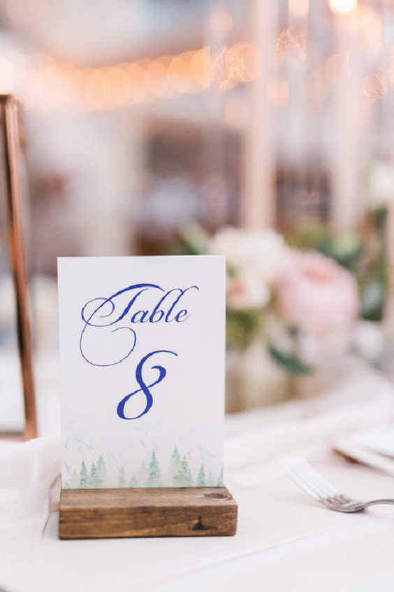 ice blue table number for ice blue and blush winter wedding 2021