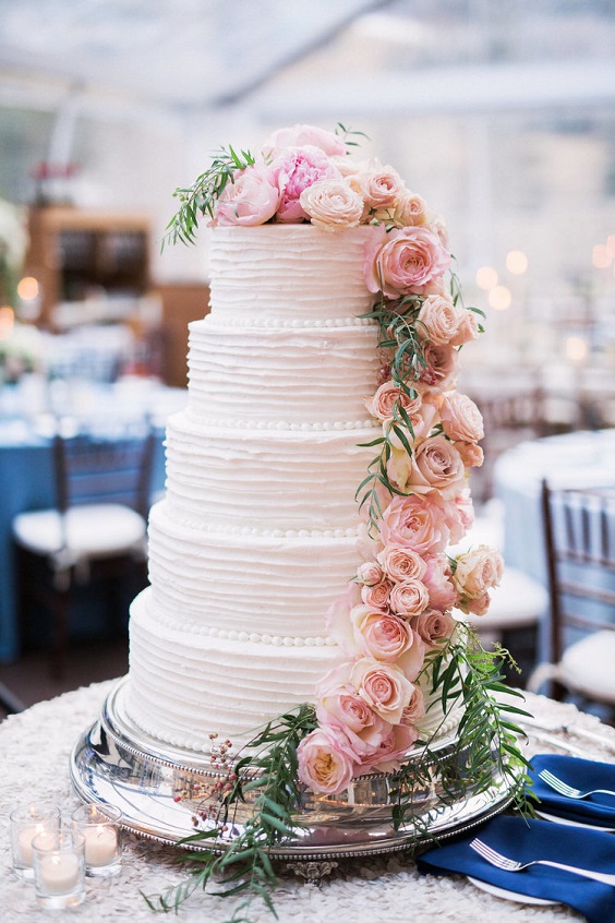 white wedding cake with blush flowers for ice blue and blush winter wedding 2021