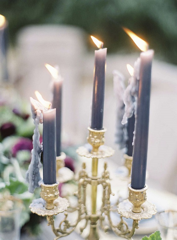 gold candle holder and dusty blue candles for dusty blue and purple fall wedding 2020