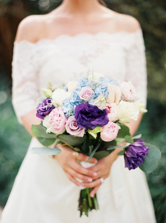 white bridal gown and bouquet for dusty blue and purple fall wedding 2020