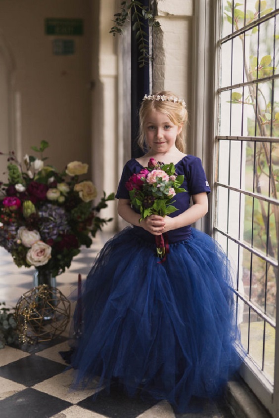 flower girl in navy blue dress for navy and burgundy fall wedding 2020