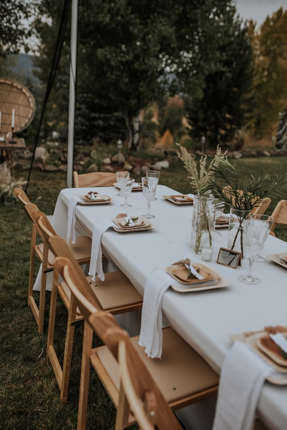 white table cloth and sage green centerpieces for white beige and sage green fall wedding 2020