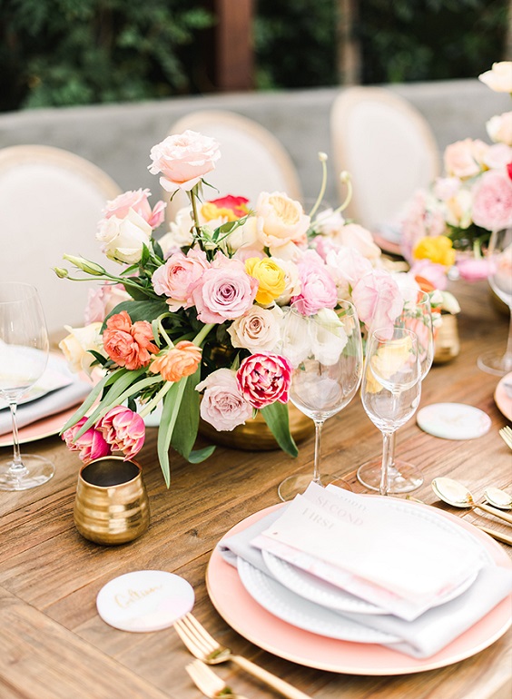 peach flower table centerpiece for peach and yellow april wedding 2020