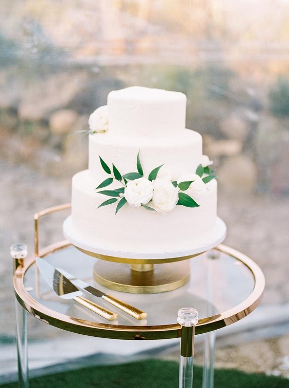 white wedding cake for dusty blue and green april wedding 2020