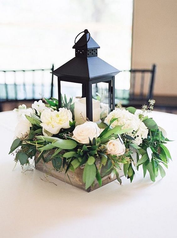 black and white table centerpiece for black and green april wedding 2020