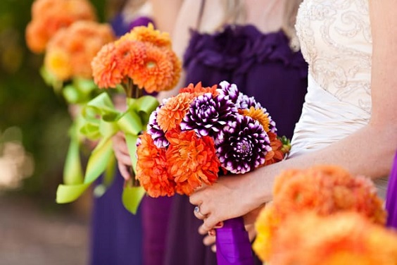 dark purple bridesmaid dresses and orange bouquets for dark purple orange october wedding colors 2020