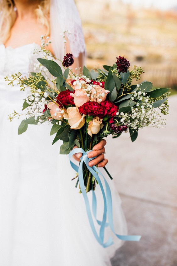 white bridal gown burgundy and dark red bouquets for dusty blue dark red october wedding colors 2020