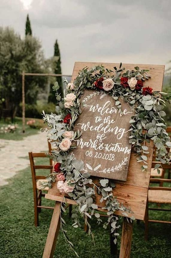 wooden welcome board for sage green and burgundy december wedding 2020