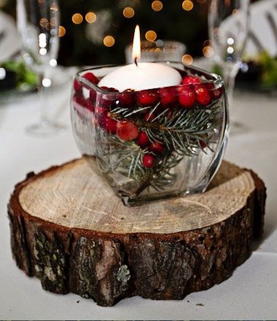 glass candle holder on wooden log for dark red and white december wedding 2020
