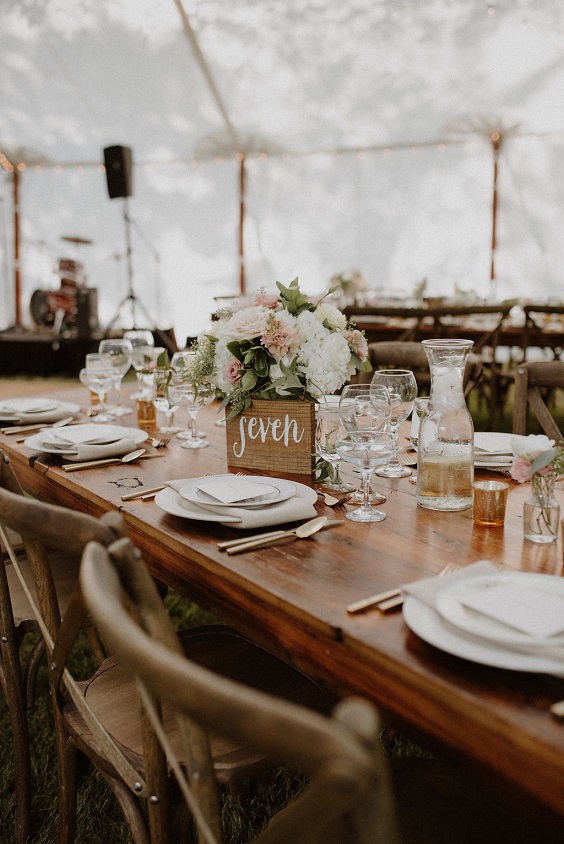 wooden table and chairs and ivory table setting for neutrals december wedding 2020