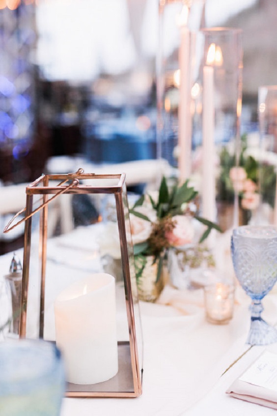geometric gilded candlesticks for ice blue white and gold december wedding 2020