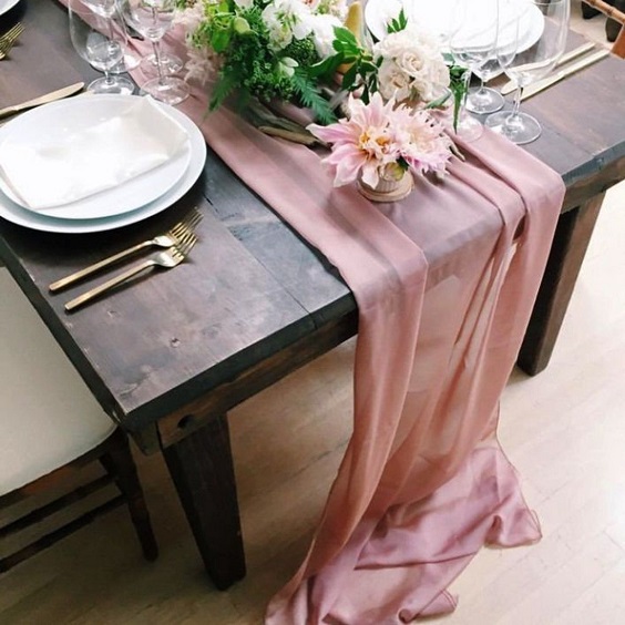 wedding table setting with dusty rose table cloth for dusty rose and green march wedding color 2021