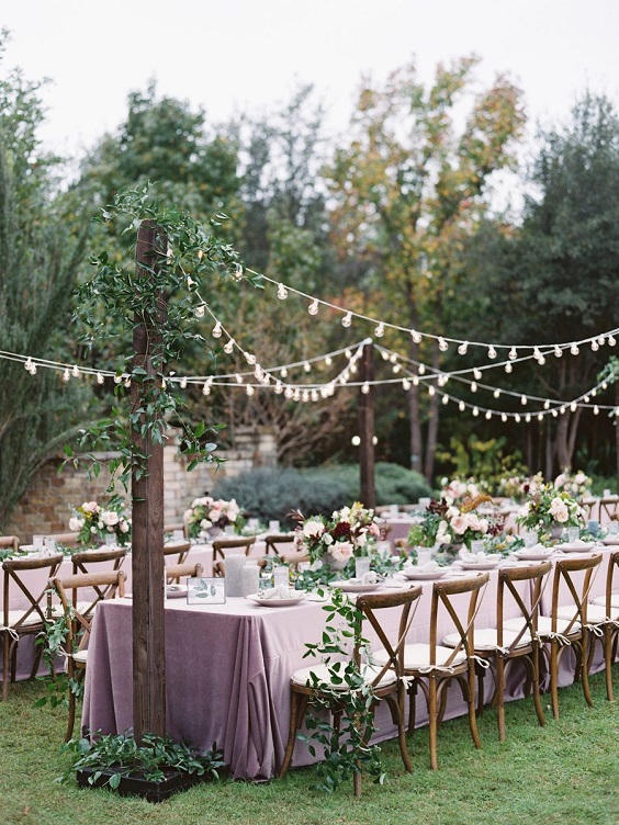 mauve wedding table setting with greenery for mauve and green march wedding color 2021