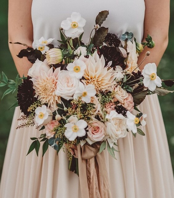 white bridesmaid dress and blush bouquets for blush and burgundy september wedding color 2020