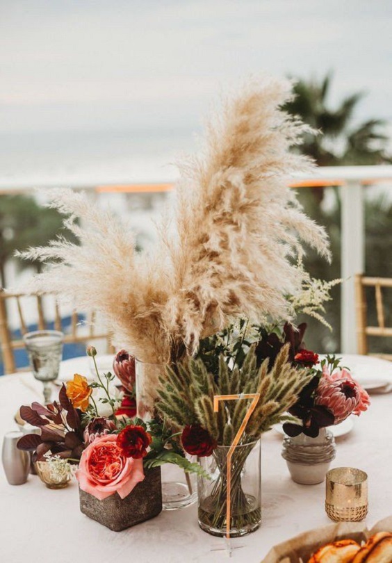 pampas grass table centerpiece for taupe and burgundy rustic fall wedding