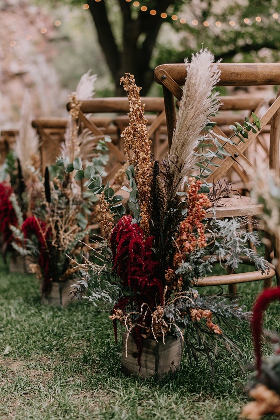 flower decor for green and maroon rustic fall wedding