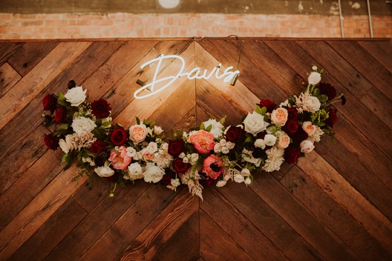 wooden decor for burgundy and orange rustic fall wedding
