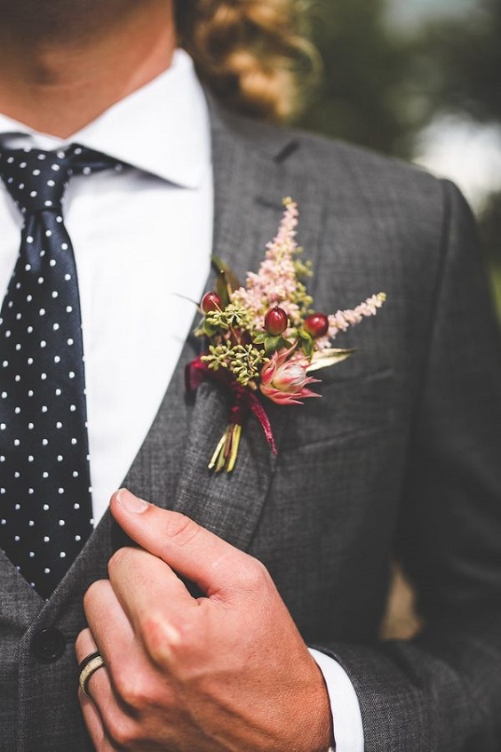grey mens suit with burgundy and blush boutonniere for burgundy fall wedding colors burgundy and grey