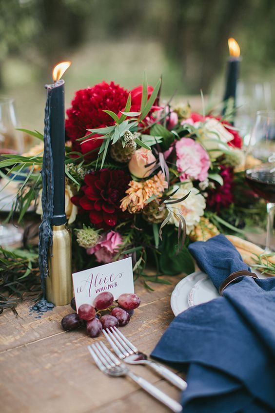 burgundy centerpiece and navy candles and napkin for burgundy fall wedding colors burgundy and navy