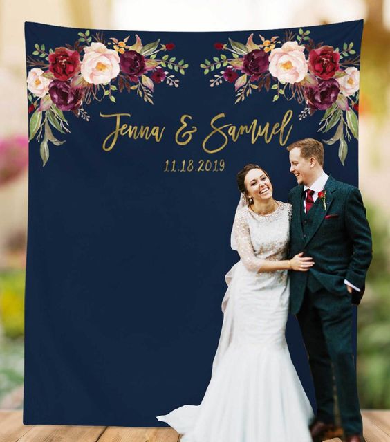navy blue wedding backdrop with burgundy flower décor for navy burgundy fall wedding colors