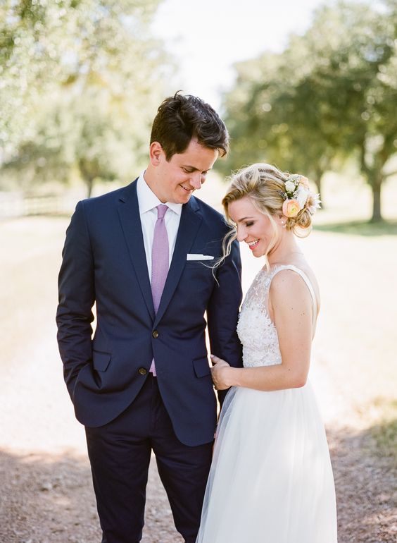navy blue groom suit with lavender tie and white bridal gown for navy lavender fall wedding colors