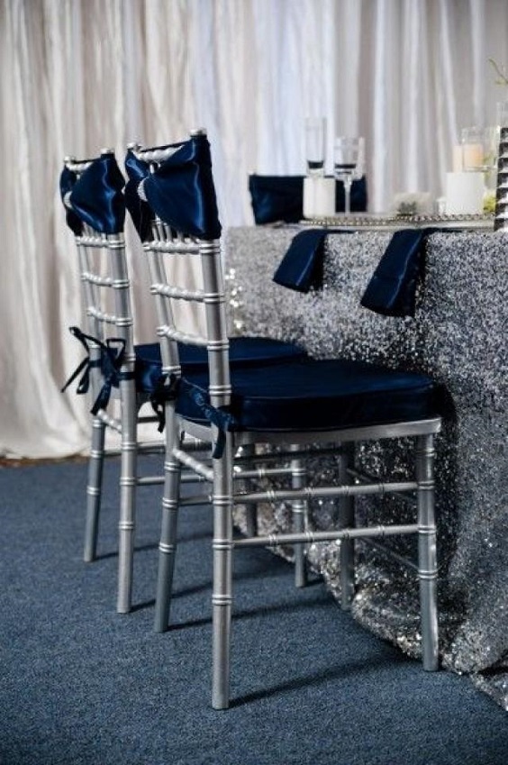 silver wedding chair with navy blue cover and sash for navy silver fall wedding colors