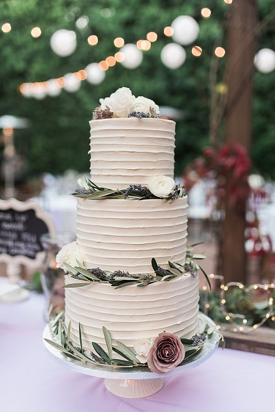 white wedding cake with greenery for purple and greenery purple fall wedding colors