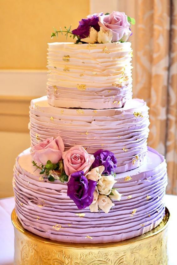 wedding cake with purple and pink flowers for purple and pink purple fall wedding colors