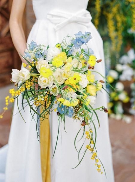 white bridal gown and bouquets for ice blue yellow may wedding colors 2020