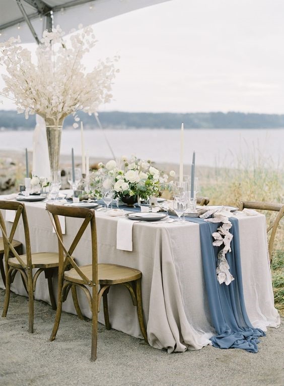 tan tablecloth and dusty blue table runner for neutral fall wedding colors grey and dusty blue