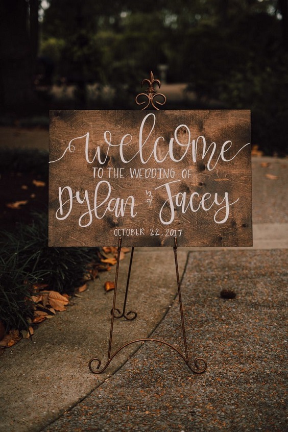 welcome board for neutral fall wedding colors brown rust and yellow