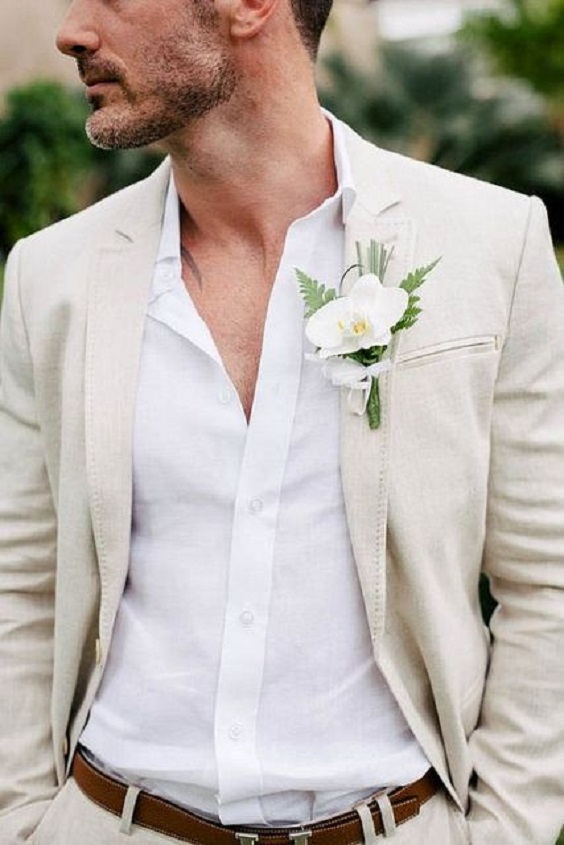 white men suit green boutonniere for white green beach wedding colors 2020