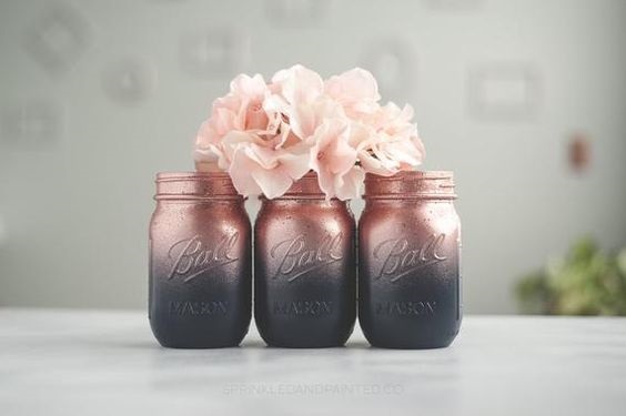 navy blue and rose gold wedding mason jar centerpieces with flowers for winter rose gold and navy blue wedding