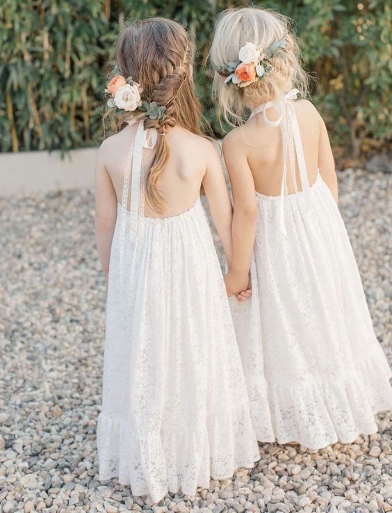white flower girl for white boho beach wedding