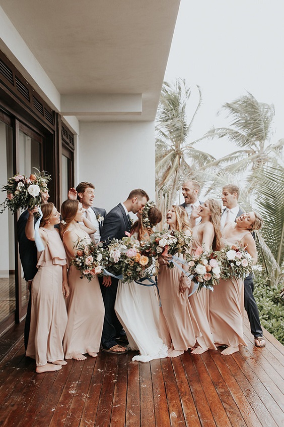 blush bridesmaid dresses and white bridal gown for blush white boho beach wedding