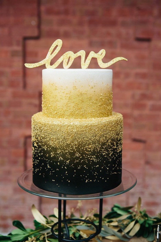 white black gold wedding cake with gold cake topper for black wihte gold wedding color