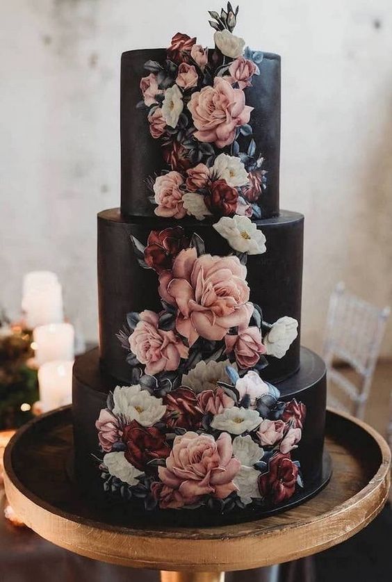 black wedding cake with blush and white flowers for black white blush wedding color