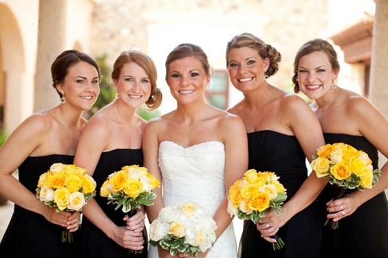 white bridal gown black bridesmaid dresses yellow bouquets for black white yellow wedding color
