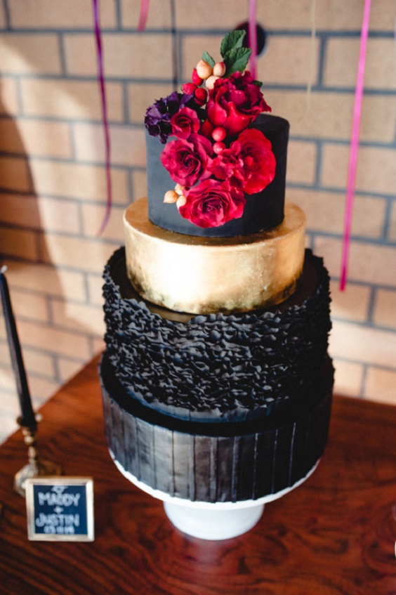 black and gold wedding cake with red flowers for red and black wedding colors red black and gold