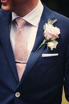 navy blue mens suit and blush tie boutonniere for navy gold and blush wedding color combo