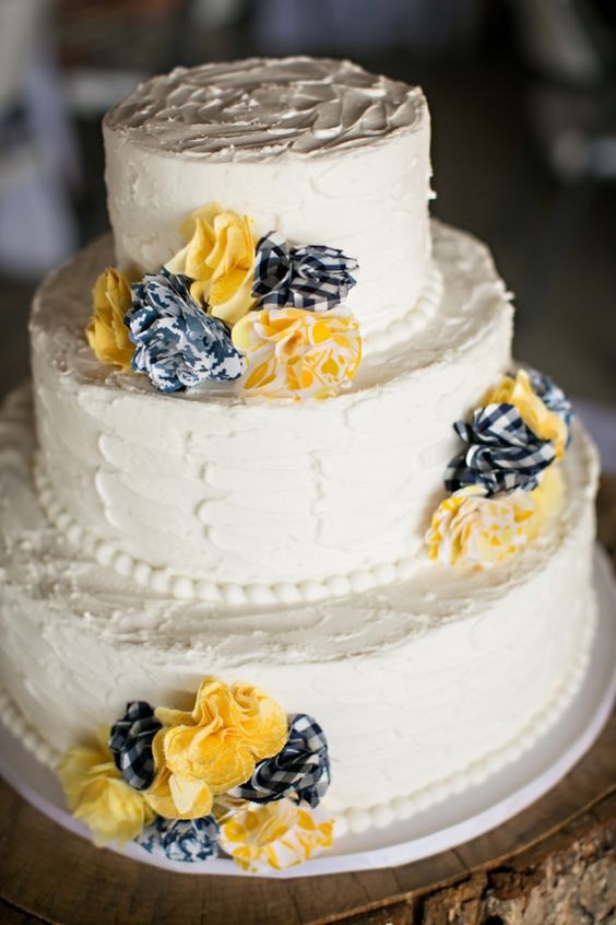 navy blue yellow wedding cakes and cake topper