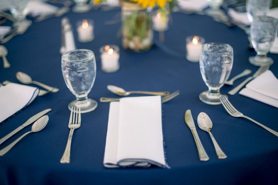 navy blue table cloth and knifes